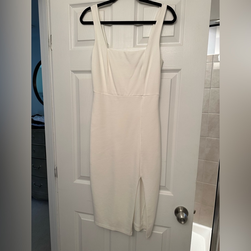 White lulu midi dress. Perfect for a rehearsal dinner!